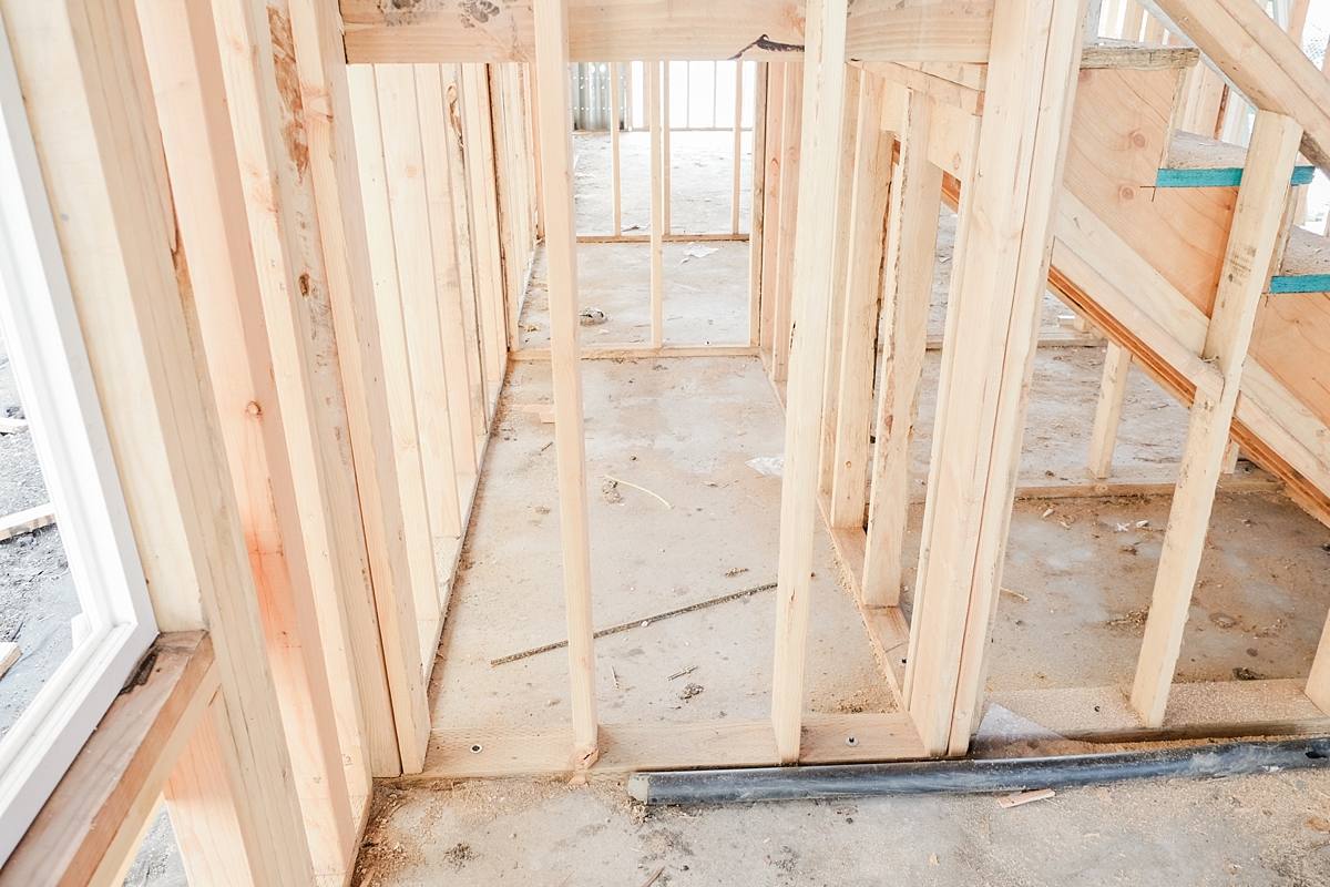 Crawl space under the stairs