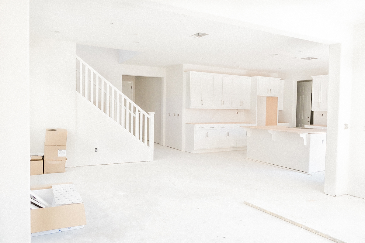 View of kitchen, dining room and front entrance from the great room