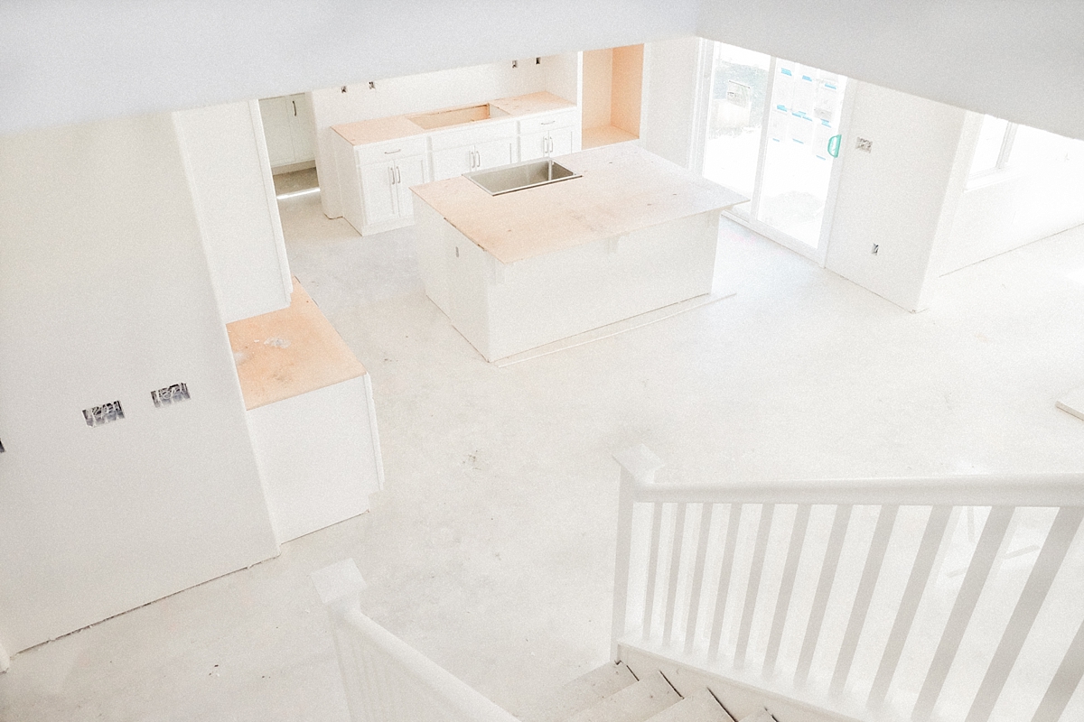 View of the kitchen and dining room from the stairs