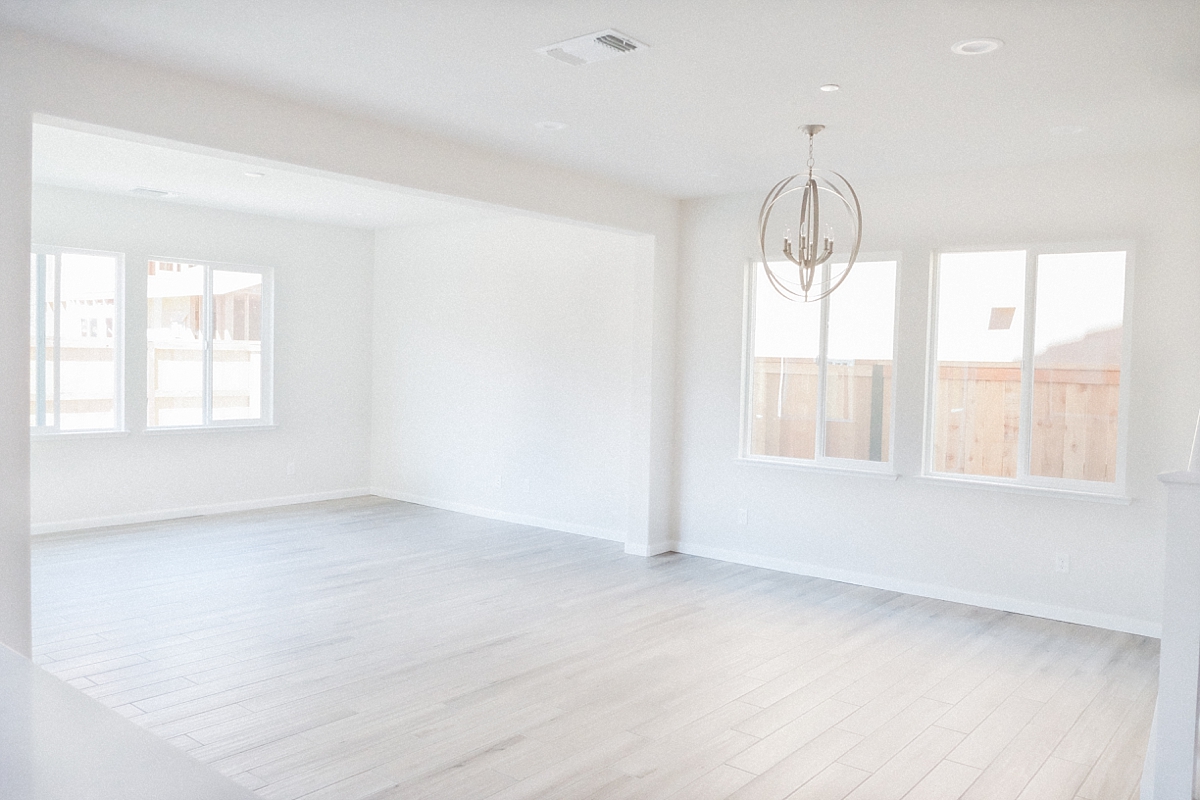 Beautiful wood look tile floor in great room and dining room