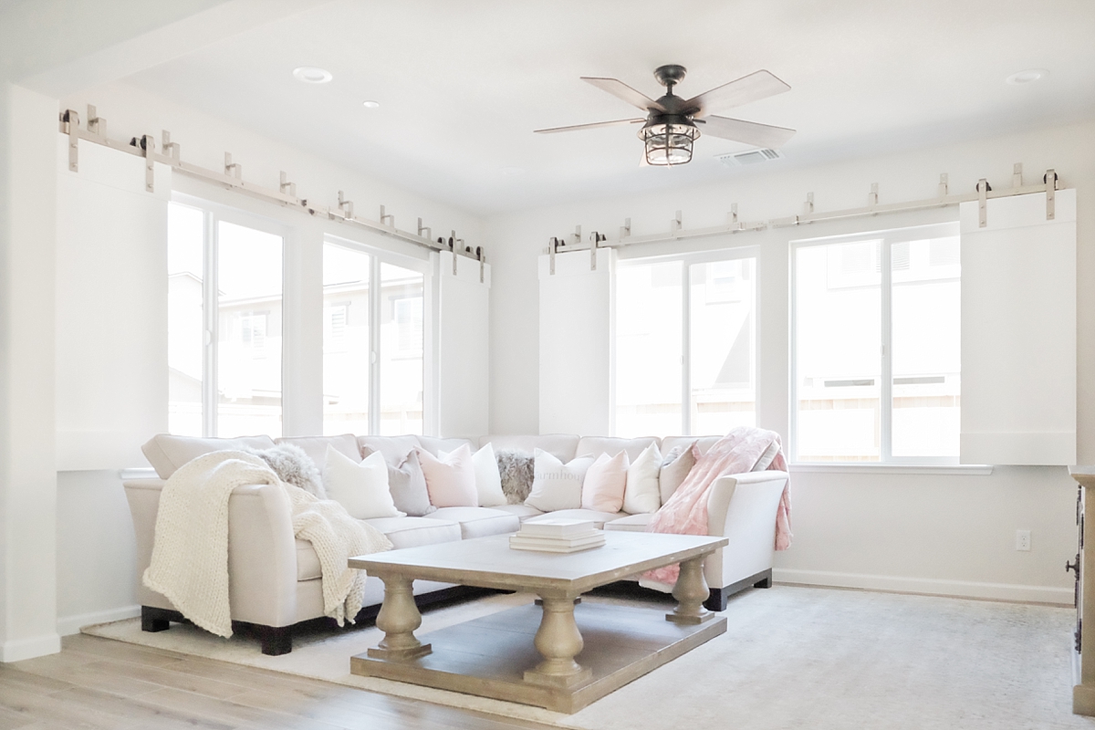 Living room with barn door shutters