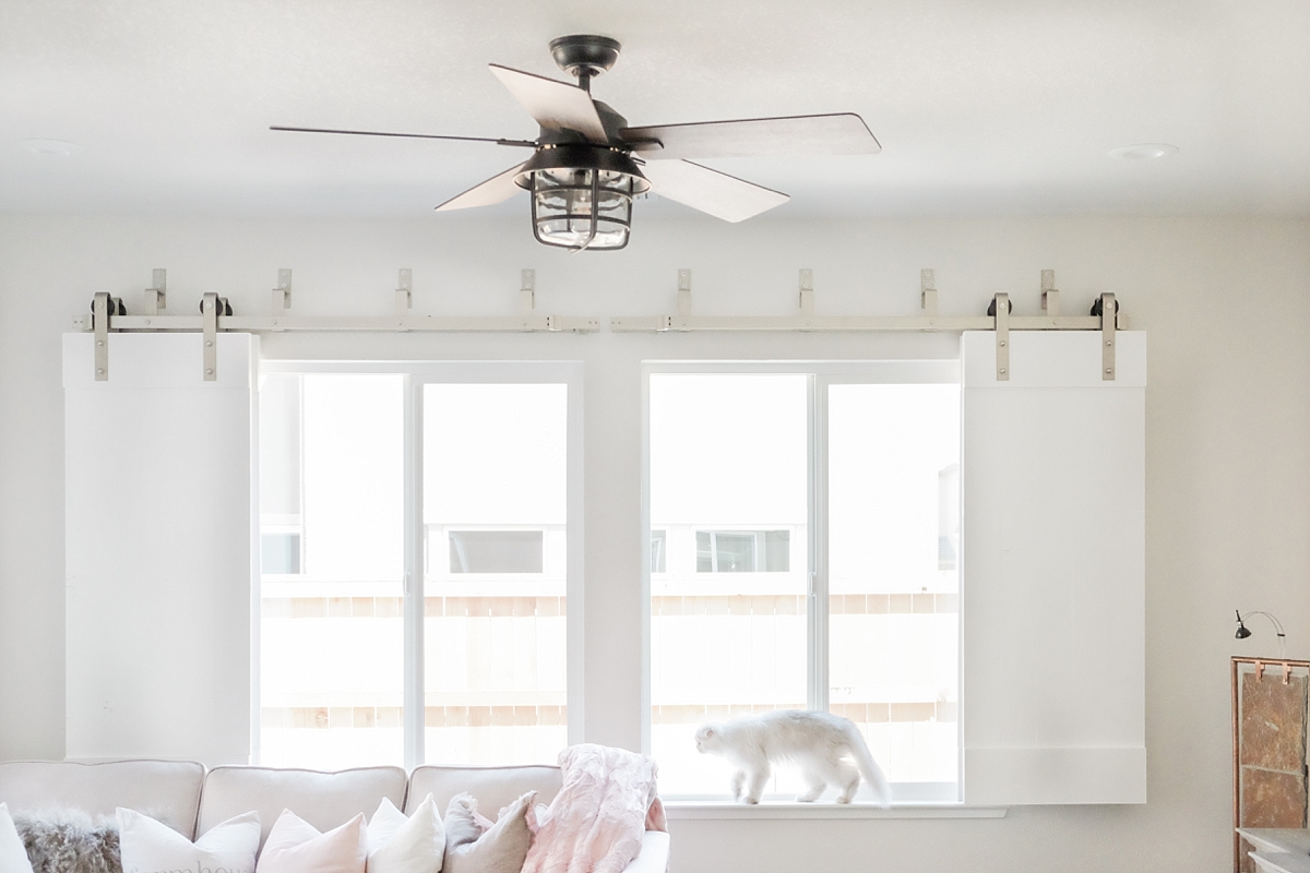 Living room with barn door shutters